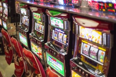 ibet77 mobile app interface showing slot games and live casino options